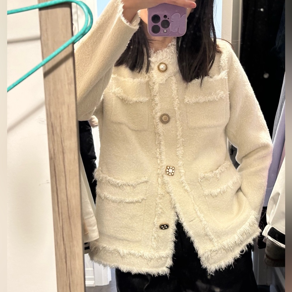 Chanel style sweater jacket
In white